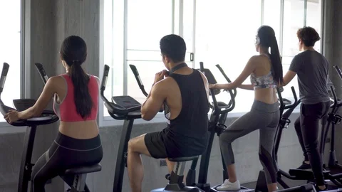 Cycling machine and elliptical machine in  gym club . fitness woman walking . Stock Footage 112278005