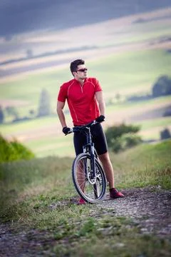 Cycling man young man cycling Cross-country (License=RF) 4379979 ,model re... Stock Photos