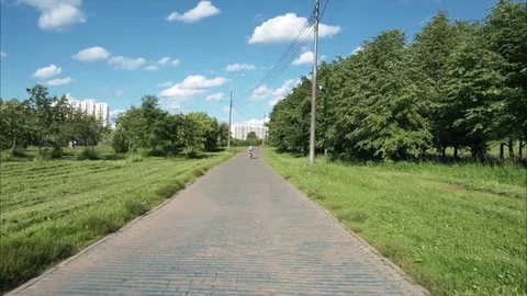 Cycling in opposite direction Stock Footage 77663285