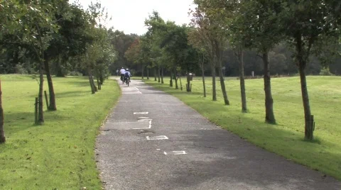 Cycling In The Park Stock Footage 241330