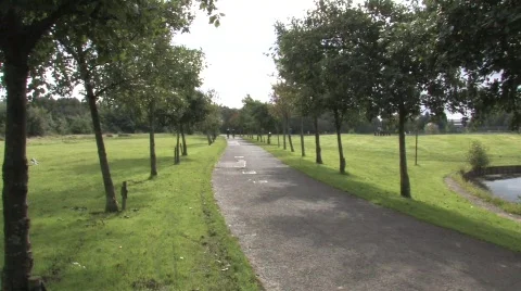 Cycling In The Park Stock Footage 241565
