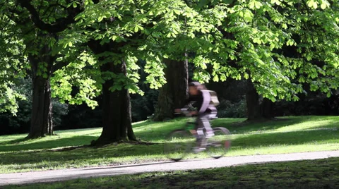 Cycling in the park Stock Footage 30684846