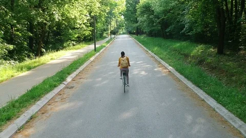 Cycling in the park Stock Footage 89451954