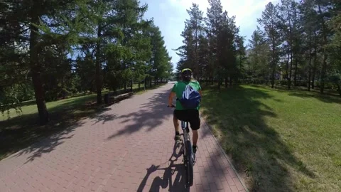 Cycling in the park. Video stock 145072885