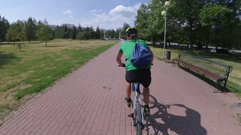 Cycling in the park. Video stock 145128522
