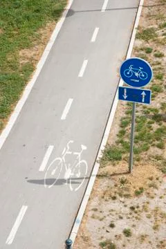 Cycling path with sign Stock Photos