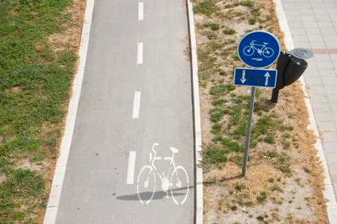 Cycling path with sign Stock Photos