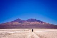 Cycling On The Salar De Uyuni Stock Photos