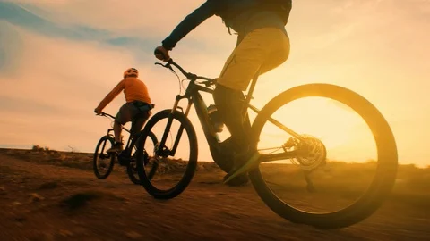 Cycling at Sunset Stock Footage 115686973