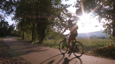 Cycling through the park - Valença Stock Footage 88617788