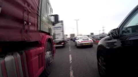 Cycling through traffic 01 Stock-Footage 46504407