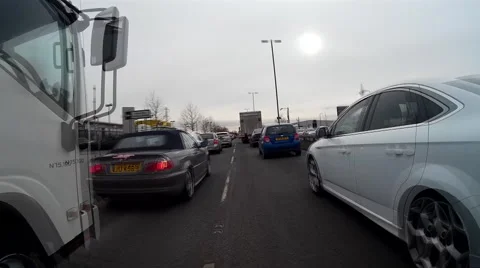 Cycling through traffic 01-ProRes 25fps Video stock 46504803