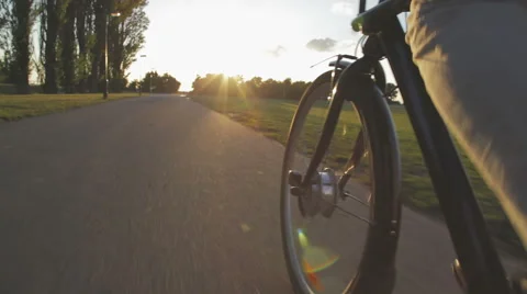 Cycling towards sunset Stock Footage 52463106
