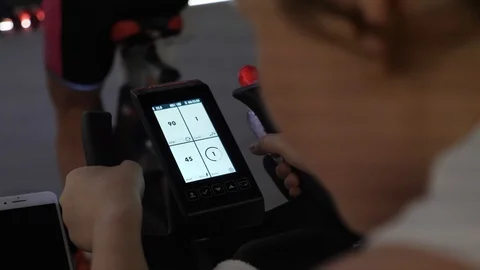 Cycling trainer computer screen. Spinning workout on stationary cycling trainer Video stock 103430430