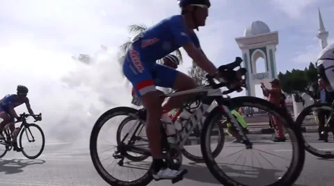 Cycling in water spray Stock-Footage 53312098