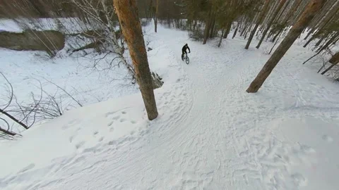 Cycling in the winter. 2 Shots. 스톡 동영상 124330618