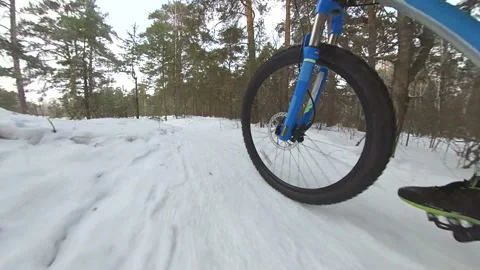 Cycling in the winter. 2 Shots. Stock Footage 124609050