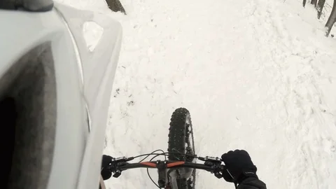Cycling in the winter forest. Action camera shot. Type front wheel. Stock Footage 71796156