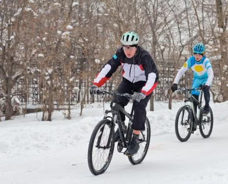 Cycling in winter Stock Photos