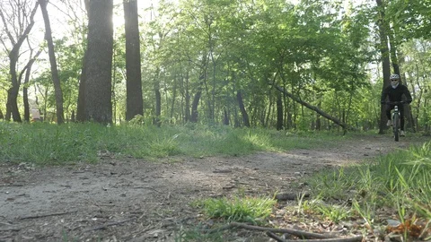 Cycling in the woods Stock Footage 129333102