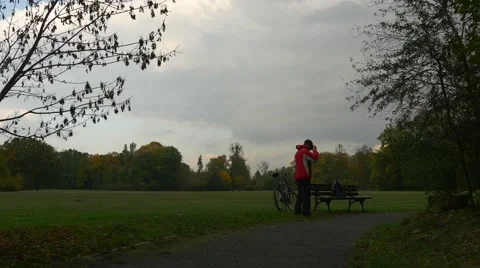 Cyclist in 360Vr Glasses Sits Down Watching Video 360 Degrees Playing Virtual Stock Footage 68796212