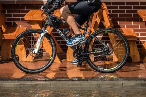Cyclist after rain Stock Photos