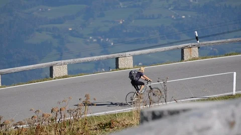 Cyclist on Alpine Road in Germany Video stock 111292396