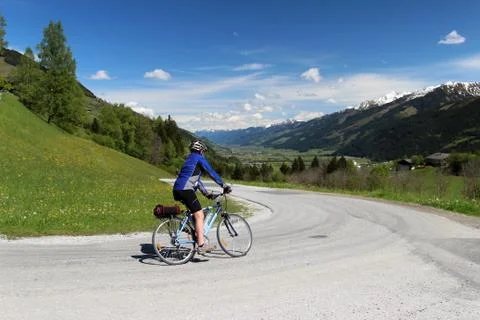 Cyclist in Alps Stock Photos