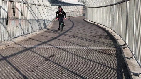 Cyclist and graphic shadows Video stock 171132161