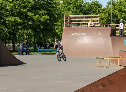 A cyclist between the slides. Stock Photos