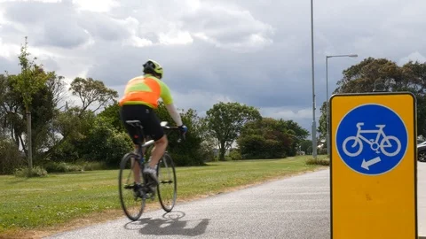 Cyclist on the bicycle path Stock Footage 106185657