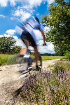 Cyclist in blurred motion Stock Photos