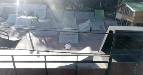 Cyclist on bmx performs tricks in skate park 스톡 동영상 103248500