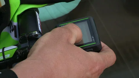 Cyclist checking data on small computer Stock Footage 37080327