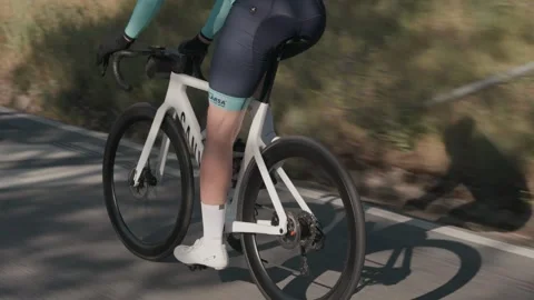 Cyclist Coasting on Road Without Pedaling During Cycling Race Stock-Footage 333698396