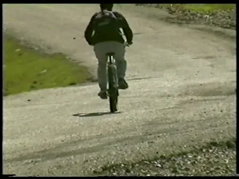 Cyclist Descending A Steep Hill Stock Footage 336301196