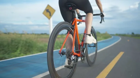 Cyclist exercise training fast riding a bike Видео 157002231