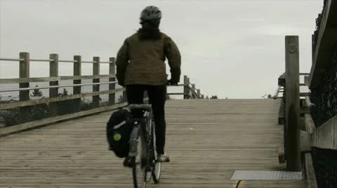 Cyclist On Galloping Goose Bridge Stock Footage 10729695