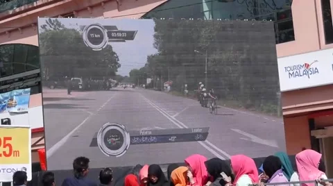 Cyclist on giant screen Stock-Footage 53311631