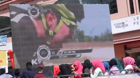 Cyclist on giant screen Stock-Footage 53311745