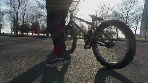 Cyclist goes forward and rolls a bicycle next to him Video stock 102504281