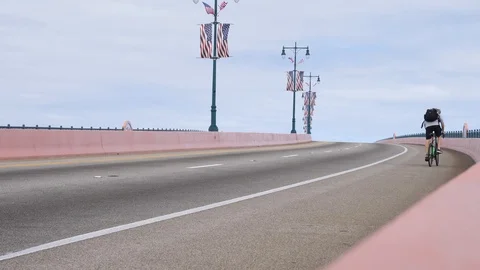 Cyclist goes uphill. Stock Footage 121290439