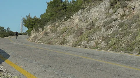 Cyclist Going Down On a Road in Slow Motion Vidéo 60052869