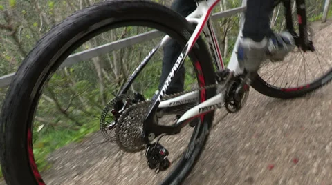 Cyclist going up slowly Stock Footage 33941085