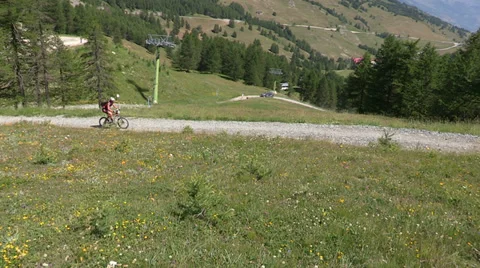 Cyclist going uphill Stock Footage 33408844
