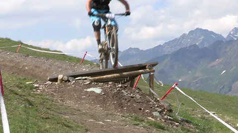 Cyclist jumping from platform Stock Footage 33061483