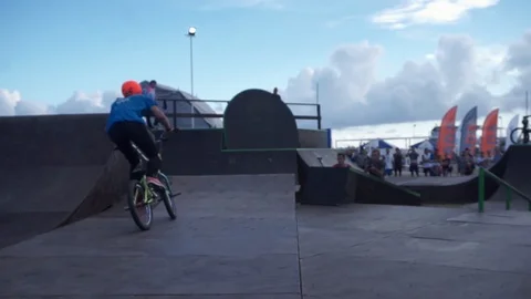 Cyclist jumps on jumps at competitions Video stock 102696963