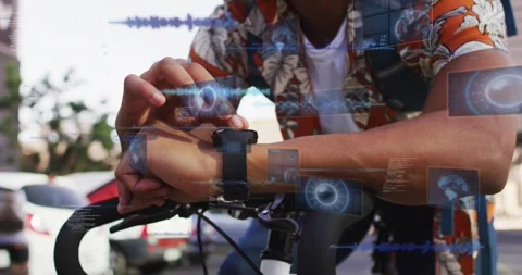 Cyclist leaning on handlebars, tapping smartwatch to check fitness data, AR Stock Footage 331833558