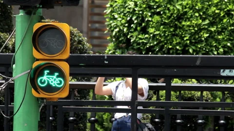 Cyclist light sign blinking. MEDIUM SHOT, HANDHELD SHOT. Stock Footage 41026696