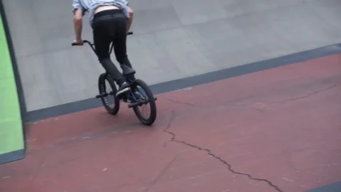 Cyclist makes a flip on a springboard and falls Stock-Footage 103217359